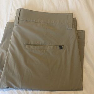 Famous Travis Matthews brand tan shorts 33 men